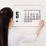 women looking at calendar
